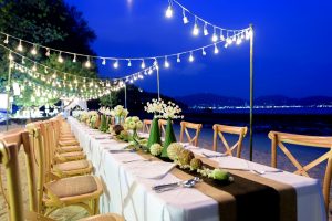 Wedding table with lights on beach